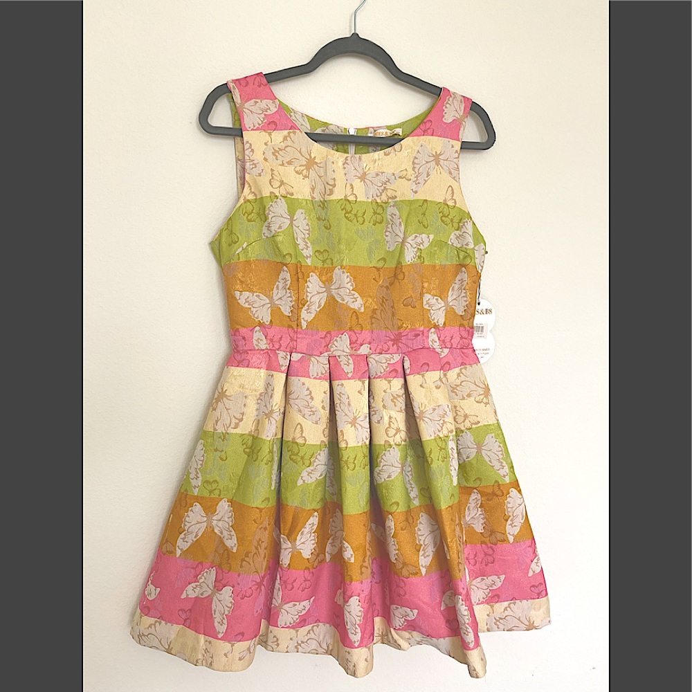 New Unique design puffy dress. Multicolored. Size 10